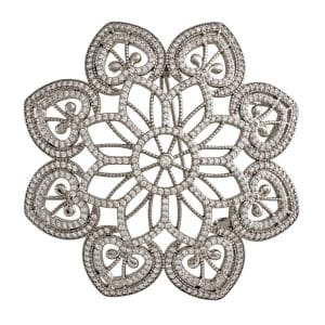 Broche floral de plata y circonitas